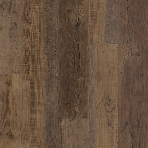 Close-up of Duxbury Oak COREtec LVP flooring with a rustic brown finish.