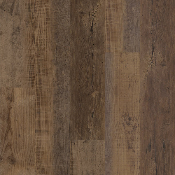 Close-up of Duxbury Oak COREtec LVP flooring with a rustic brown finish.