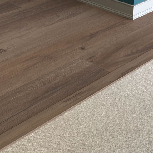 Baby Threshold trim piece. Used for transition between coretec flooring and other flooring surfaces like carpet or tile.