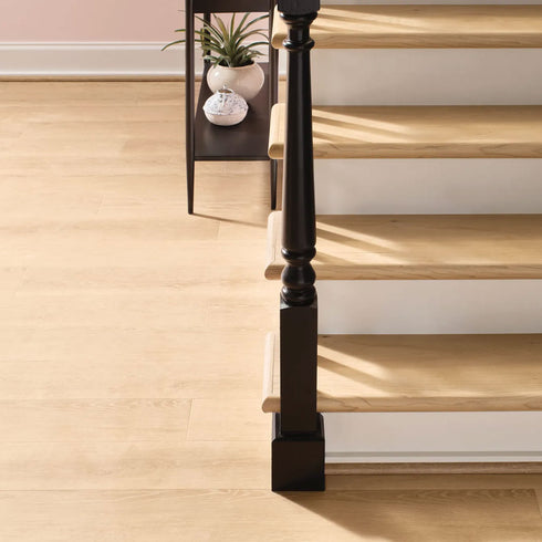 COREtec Wheat Oak flooring and stair treads.