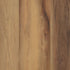 A close-up image of a Belmont Hickory brown hickory wood-patterned COREtec luxury vinyl flooring plank.